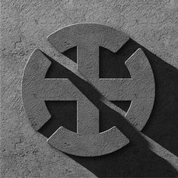 Symbol krzyża w okręgu wycięty w kamieniu