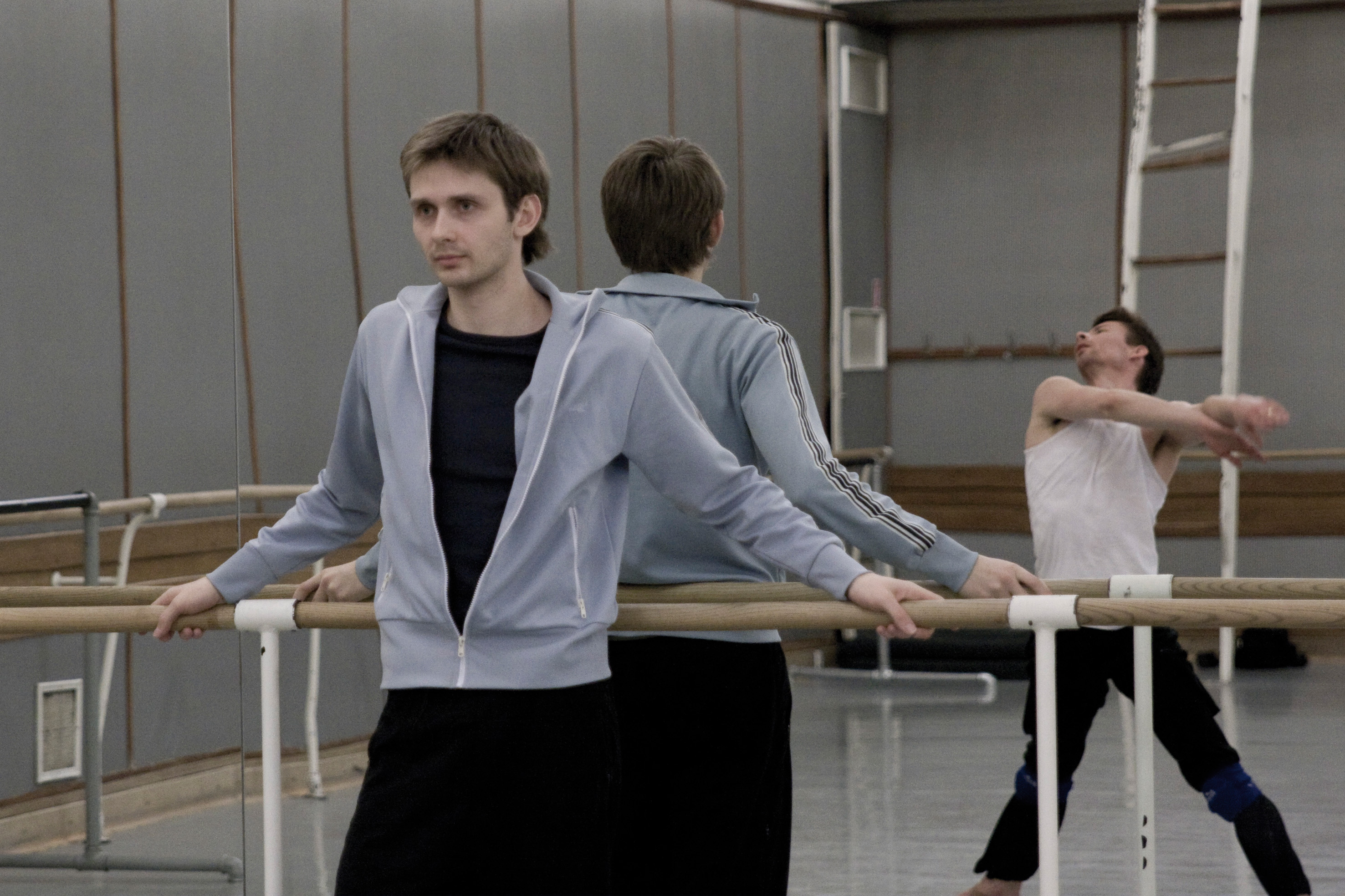 A closeup of Robert Bondara in a ballet studio