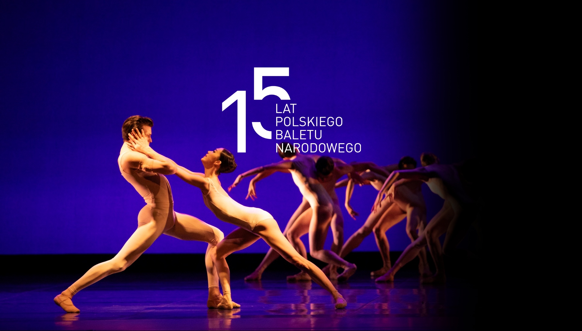 Group of dancers in nude leotards performing onstage